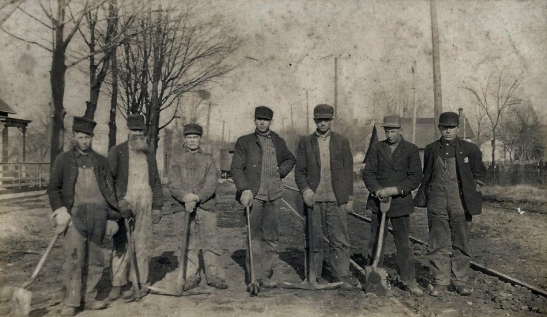 History Mystery Photo #17  "I've been workin' on the railroad . . ."    The Heyworth Public Library holds this picture in its archives.  Who are these workers?  Where in town are they standing? Approximately what year was the picture taken?  Any information you can provide about this picture would be appreciated!  Contact the library at 473-2313. 